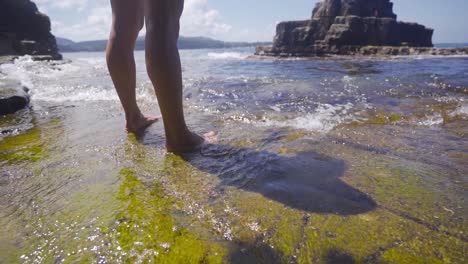 Feet-entering-the-sea-in-slow-motion.